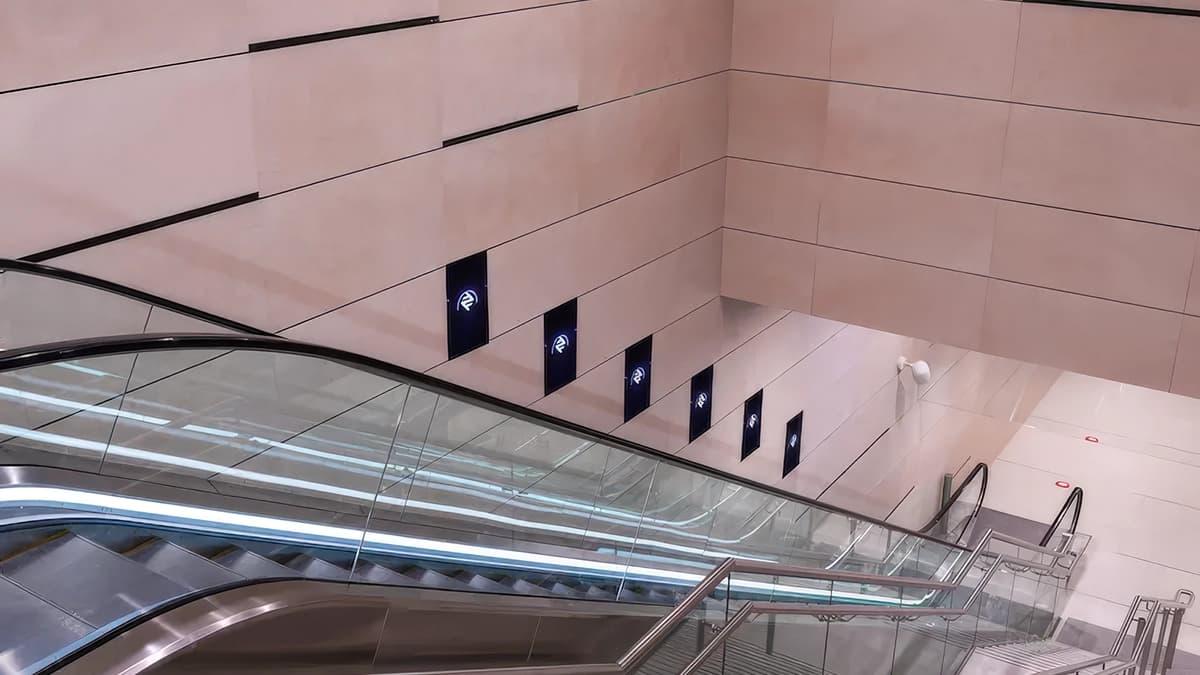 Escalator panel advertising in a Saudi Arabia metro station