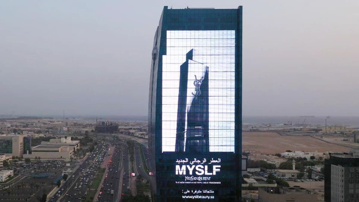 King Road Tower media façade showing a YSL MYSLF fragrance campaign over King Abdul Aziz Road, Jeddah